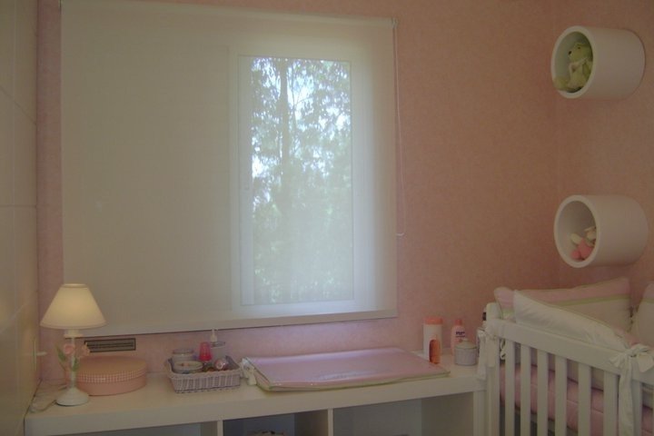 Sheer window shade in a nursery
